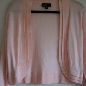 Woman knit open front sweater - lightweight - it feels like Jersey.